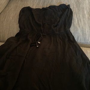 Black sleeveless jump suit with pockets